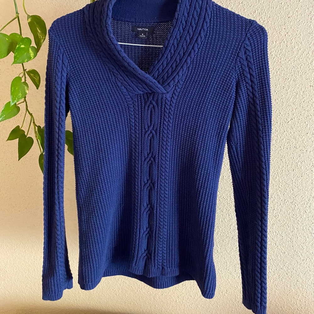 Nautical cable knit blue sweater.
